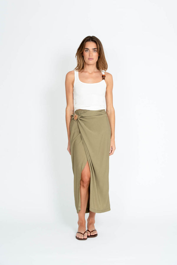 Ellotti white tank top and olive green skirt on a white background